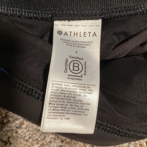 Athleta Headlands Hybrid Cargo Tight Pants Size 4 Black Zip Pockets Front & Back - Picture 8 of 9